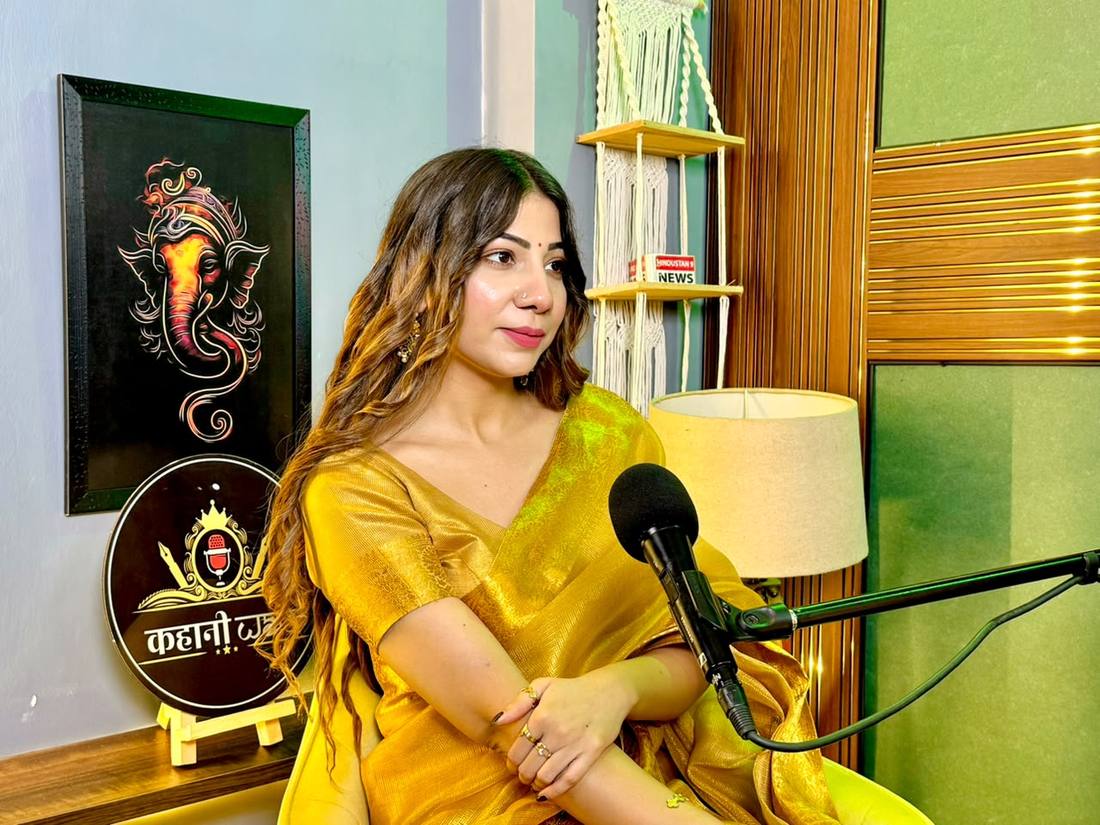 Neha on a podcast set